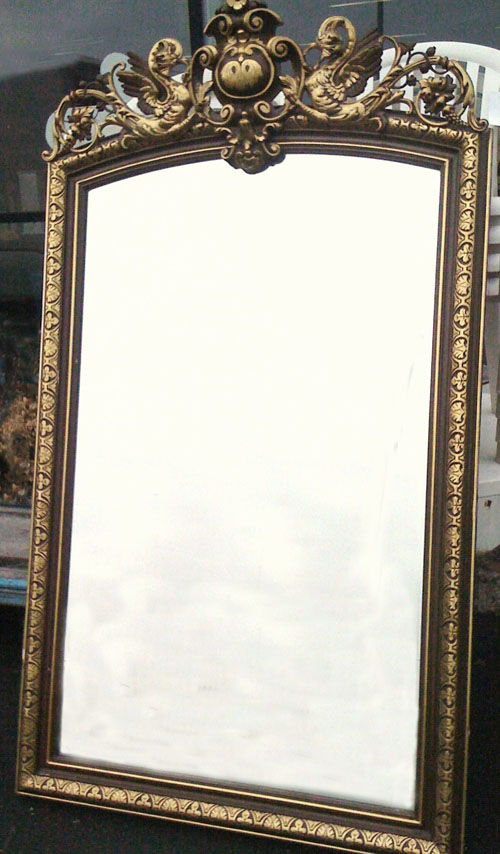 large antique crested mirror